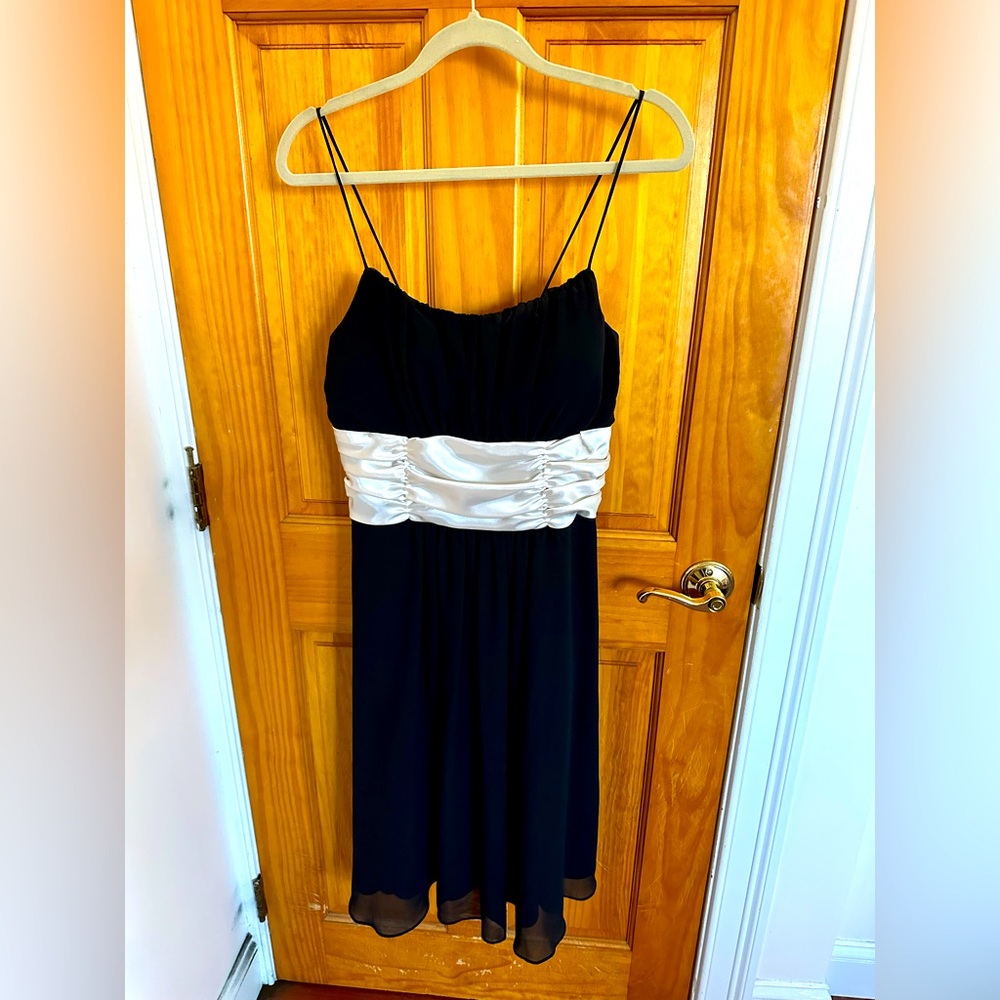 Pretty black dress with white silk waist. Size 12.